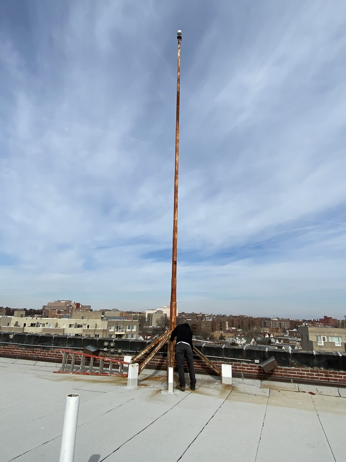 NYC Rooftop flagpole painting NYC Flag Repair