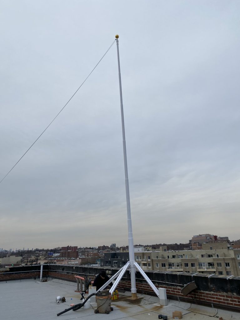 NYC Rooftop flagpole painting NYC Flag Repair