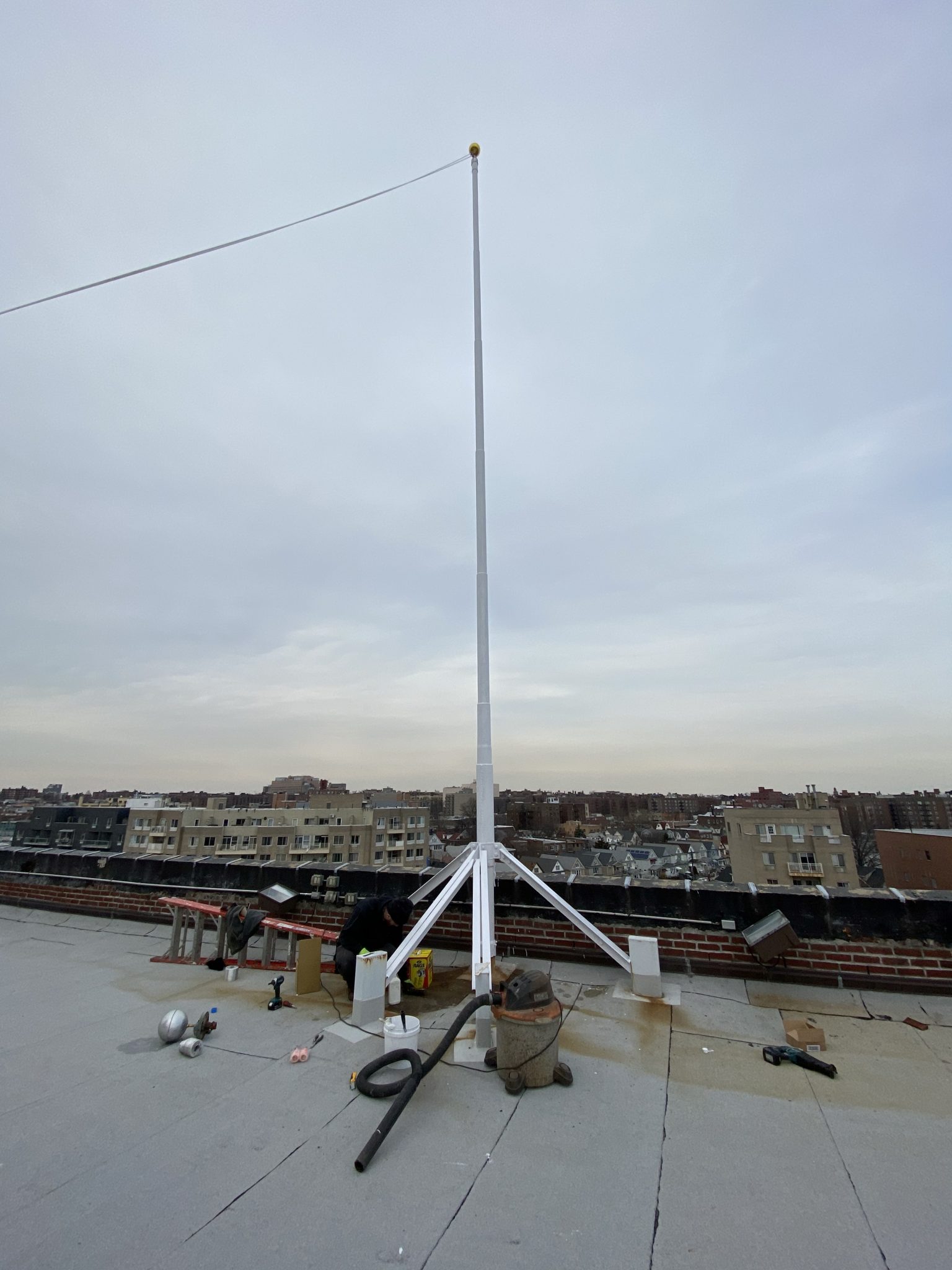 NYC Rooftop flagpole painting NYC Flag Repair